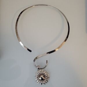 Radiant Silver Sunburst Pendant Necklace